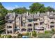 Elegant multi-story townhome with patios, lush landscaping, and beautiful views for a serene lifestyle at 657 Portside Dr, Davidson, NC 28036