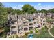 Beautiful townhome with manicured grounds, multiple patios, and serene views for upscale living at 657 Portside Dr, Davidson, NC 28036