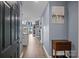 Inviting foyer with hardwood floors leading to the kitchen and living area at 657 Portside Dr, Davidson, NC 28036