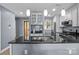 Modern kitchen with stainless steel appliances and granite countertops at 657 Portside Dr, Davidson, NC 28036