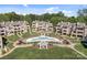 Upscale community featuring a stylish pool, lush landscaping, and manicured grounds for resort-style living at 657 Portside Dr, Davidson, NC 28036