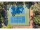 Aerial view of the community tennis courts in a wooded area at 657 Portside Dr, Davidson, NC 28036