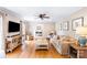 Spacious living room featuring a sofa, console table and decorative decor at 6718 Summerlin Pl, Charlotte, NC 28226