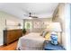 Comfortable main bedroom with neutral walls, hardwood floors, and a ceiling fan at 6718 Summerlin Pl, Charlotte, NC 28226