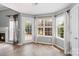 Cozy breakfast nook with ample natural light, tile flooring, and access to the backyard at 6849 Blake Brook Dr, Concord, NC 28025