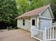 Charming backyard deck with access to the garage and patio, perfect for outdoor relaxation and entertaining at 7409 Gilderstern Glen Ct, Huntersville, NC 28078