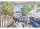 Charming screened porch with comfortable seating and a view of the outdoor space at 7409 Gilderstern Glen Ct, Huntersville, NC 28078