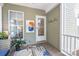 Relaxing screened porch area with stylish decor, natural light, and access to backyard at 7409 Gilderstern Glen Ct, Huntersville, NC 28078