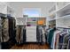 Walk-in closet with custom shelving and ample storage space for clothes and accessories at 767 Pinnacle Dr, Iron Station, NC 28080
