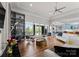 Bright and spacious living area seamlessly flowing into the dining area and kitchen at 767 Pinnacle Dr, Iron Station, NC 28080
