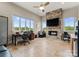 Large office with a stone fireplace, built-ins, and ample windows, perfect for a productive workspace at 767 Pinnacle Dr, Iron Station, NC 28080
