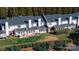 Overhead view shows townhouses with green lawns and shrubbery, highlighting the community layout at 825 21St Ne Ave, Hickory, NC 28601