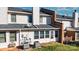 Townhouse backyard with patio, grass area, and brick detailing visible, offering a cozy outdoor space at 825 21St Ne Ave, Hickory, NC 28601