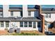 Townhouse backyard with patio, grass area, and brick detailing visible, offering a cozy outdoor space at 825 21St Ne Ave, Hickory, NC 28601
