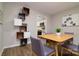 Cozy dining room adjacent to the kitchen with modern decor and laminate flooring at 825 21St Ne Ave, Hickory, NC 28601