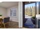 Dining room with new flooring and view of landscaped outdoor area through window at 825 21St Ne Ave, Hickory, NC 28601