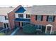 Brick townhome featuring black shutters, gray roof and small front yard at 825 21St Ne Ave, Hickory, NC 28601