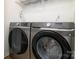 Convenient laundry area with modern side-by-side Samsung washer and dryer at 825 21St Ne Ave, Hickory, NC 28601