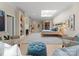 Open concept bedroom with a skylight, fireplace, seating area, and bright atmosphere at 974 Queens Rd, Charlotte, NC 28207