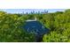 Stunning home with lush landscaping and beautiful views of the Charlotte skyline at 974 Queens Rd, Charlotte, NC 28207