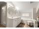 Well-lit bathroom with dual sinks, walk-in shower and soaking tub at 10139 Arlington Church Rd, Mint Hill, NC 28227