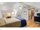 Bedroom featuring hardwood floors, a ceiling fan, and a cozy atmosphere at 10139 Arlington Church Rd, Mint Hill, NC 28227
