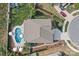 Drone shot showcasing roof, driveway, backyard pool, and manicured landscaping at 106 Wrangler Dr, Mooresville, NC 28115