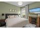 Cozy bedroom featuring a queen bed, soft lighting, and a calming color palette at 106 Wrangler Dr, Mooresville, NC 28115