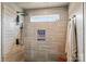 Luxurious bathroom with tiled shower featuring a niche and rainfall showerhead at 106 Wrangler Dr, Mooresville, NC 28115