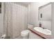 Clean bathroom features a patterned shower curtain, toilet, and a vanity with mirror at 1106 3Rd Sw Ave, Hickory, NC 28602