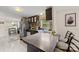 Eat-in kitchen with stainless steel appliances, tile backsplash, and breakfast bar at 1106 3Rd Sw Ave, Hickory, NC 28602