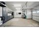 Organized garage with custom cabinets, bike racks and plenty of space for storage and hobbies at 1116 Brooksland Pl, Waxhaw, NC 28173