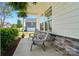 Cozy porch with seating, perfect for relaxing and enjoying the neighborhood view at 1116 Brooksland Pl, Waxhaw, NC 28173