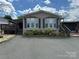 Charming home with landscaping and large driveway at 116 Dove Ln, New London, NC 28127