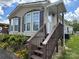 Charming home with steps, nice windows, and landscaping at 116 Dove Ln, New London, NC 28127