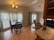 Open-concept living area with large windows, neutral walls, and space for dining and relaxation at 116 Dove Ln, New London, NC 28127