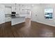 Spacious living area with hardwood floors, with natural light and an open concept at 11933 Silverheel Ln, Huntersville, NC 28078