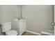 Modest bathroom with white vanity, toilet, and a mirrored medicine cabinet at 1204 Glenarden Dr, Rock Hill, SC 29730