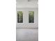 Bright bedroom with clean, neutral tones, expansive windows, and polished concrete floor at 122 Laura Rd # A, Mooresville, NC 28117