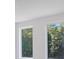 Bright room featuring windows looking out onto the dense, wooded landscape at 122 Laura Rd # A, Mooresville, NC 28117
