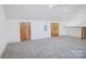 Bonus room features carpet flooring, neutral paint, skylights, recessed lighting, and railings at 122 Laura Rd # A, Mooresville, NC 28117