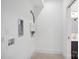 Bright laundry room featuring modern utility connections and minimalist design at 122 Laura Rd # A, Mooresville, NC 28117