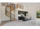 Spacious living area with spiral staircase, modern kitchen, and loft-style design at 122 Laura Rd # A, Mooresville, NC 28117