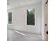 Spacious bedroom featuring large windows that provide ample natural light and outdoor views at 122 Laura Rd # B, Mooresville, NC 28117