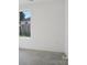 Bright bedroom with large window showcasing an exterior view and letting in natural light at 122 Laura Rd # B, Mooresville, NC 28117