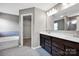 Bright bathroom featuring double vanity, soaking tub, and walk-in closet at 13408 Portside Ln, Lancaster, SC 29720