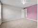 Carpeted bedroom with neutral colors and an adjacent doorway at 13408 Portside Ln, Lancaster, SC 29720