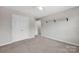 Spacious carpeted bedroom with large closet and neutral colors at 13408 Portside Ln, Lancaster, SC 29720