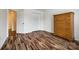 Bedroom featuring hardwood floors, closet space and dresser at 1418 Lonan Dr, Waxhaw, NC 28173
