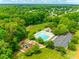 Aerial view of the community pool and playground in a lush green area at 1418 Lonan Dr, Waxhaw, NC 28173